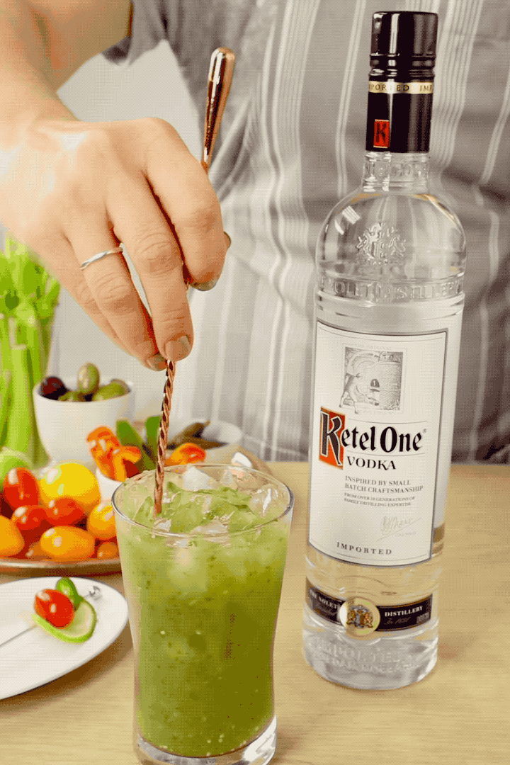 Cocktail Garnish Cinemagraph Green Mary cocktail with moving garnish element